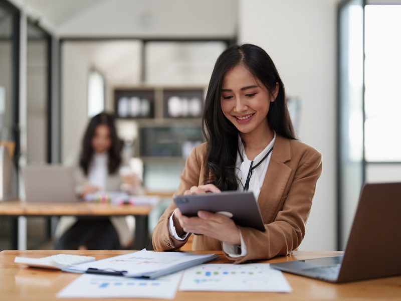 Group of business consultant working management big data and analyze financial document of company