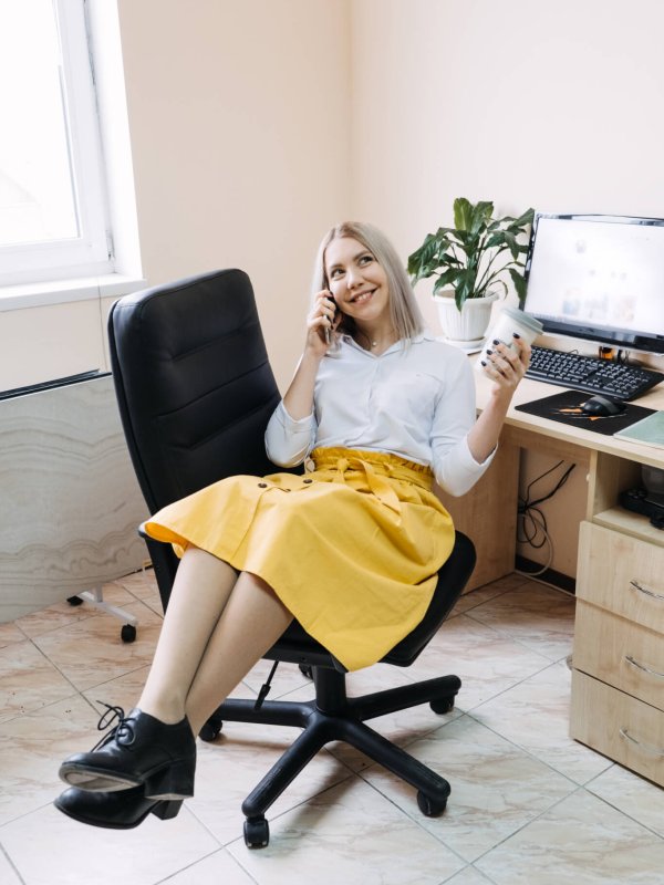 SMM specialist, Social Media Expert, Remote Social Media Pro. Young girl SMM manager with a phone at