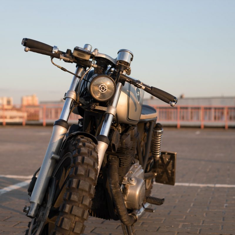 Vintage custom motorcycle on parking