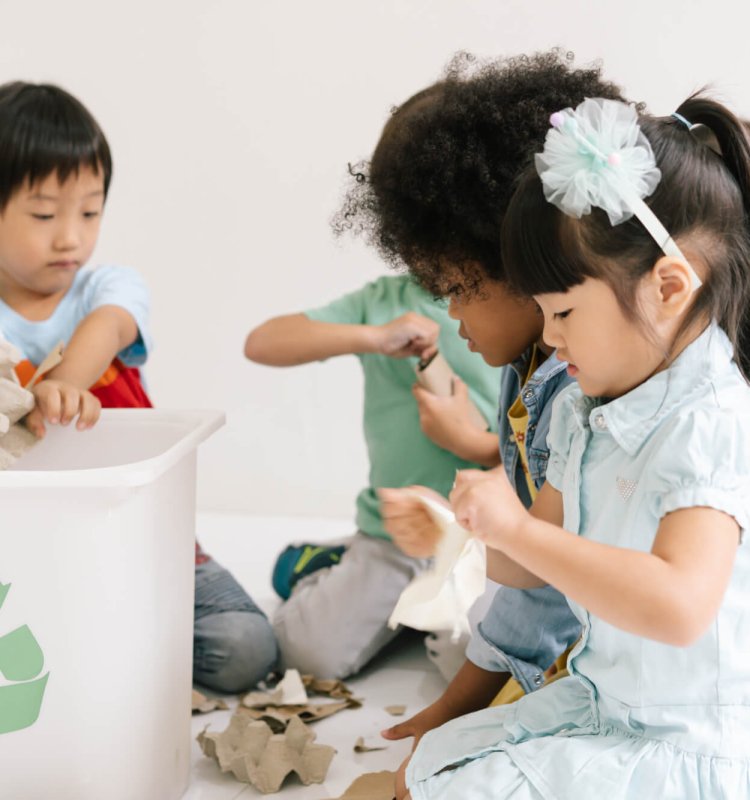 Group of adorable kids school kindergarten learning biology recycle environment in classroom.