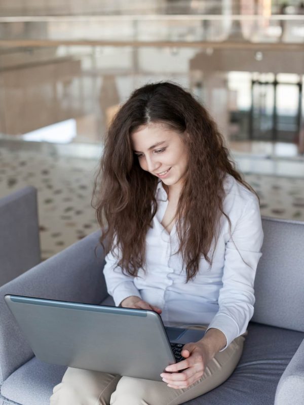 woman-working-with-laptop-at-the-office-people-using-technology-at-workplace-and-office-culture