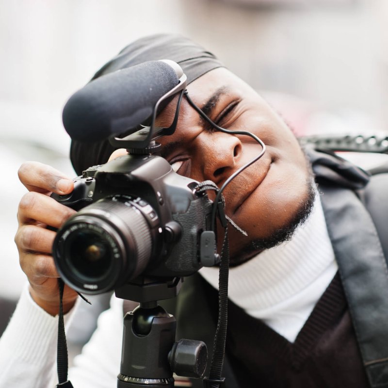 Young professional african american videographer