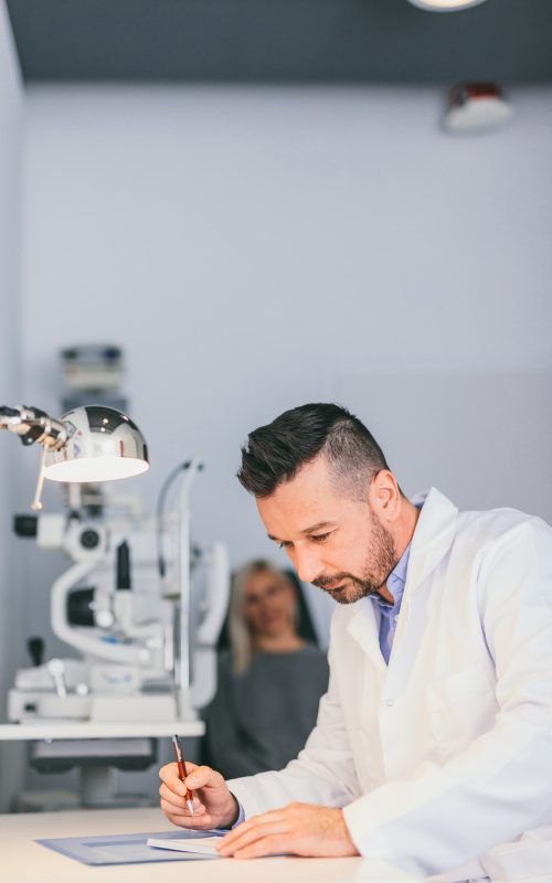 Doctor perscribing a treatment for a patient.